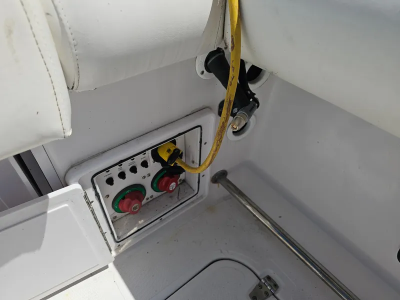 Slide: The Image of Electrical panel on 2008 Pro-Line 29 Grande Sport boat with yellow cable connection. - 13