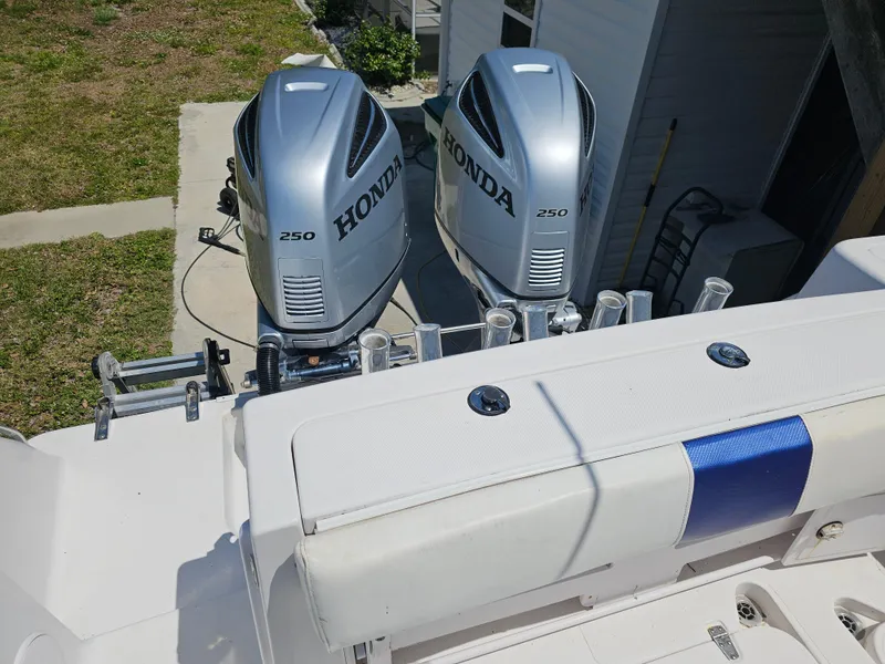 Slide: The Image of 2008 Pro-Line 29 Grande Sport boat with dual Honda 250 outboard engines. - 14