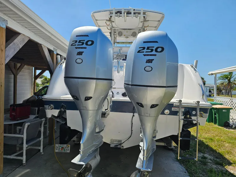 Slide: The Image of 2008 Pro-Line 29 Grande Sport boat with dual Honda 250 outboard engines. - 16