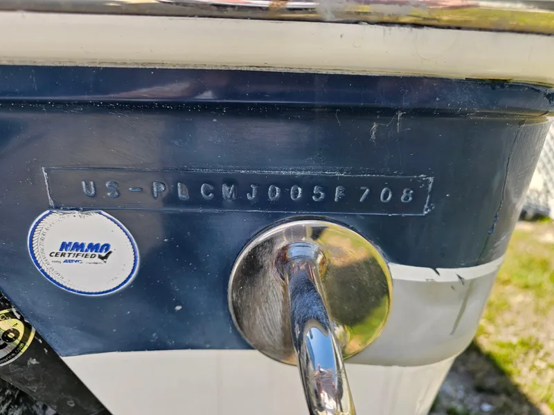 Slide: The Image of 2008 Pro-Line 29 Grande Sport boat with hull identification number and NMMA certification sticker. - 17