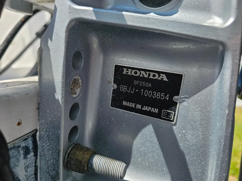 Slide: The Image of Honda BF250A engine plate on 2008 Pro-Line 29 Grande Sport boat. Made in Japan. - 18