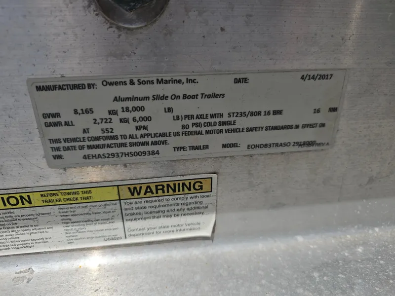 Slide: The Image of Label on aluminum boat trailer by Owens & Sons Marine, dated 4/14/2017. - 24