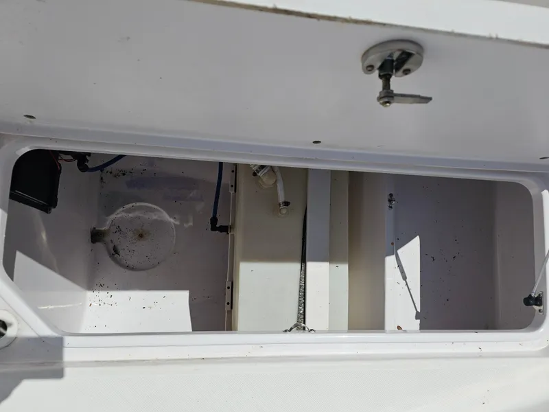 Slide: The Image of Open storage compartment in 2008 Pro-Line 29 Grande Sport boat. - 30