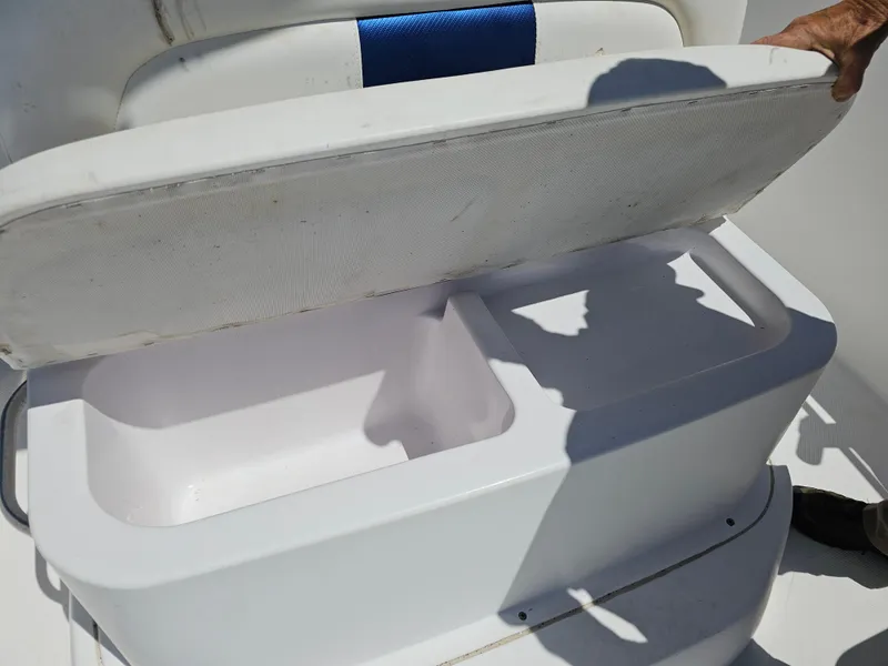 Slide: The Image of Open storage compartment on 2008 Pro-Line 29 Grande Sport boat. - 32