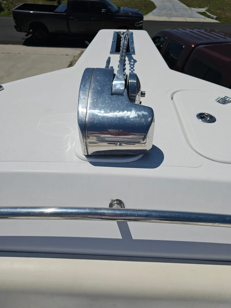 Slide: The Image of 2008 Pro-Line 29 Grande Sport boat anchor winch on deck, close-up view. - 5
