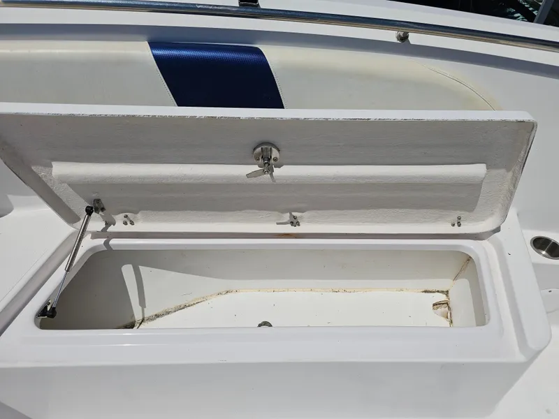 Slide: The Image of Open storage compartment on 2008 Pro-Line 29 Grande Sport boat. - 6