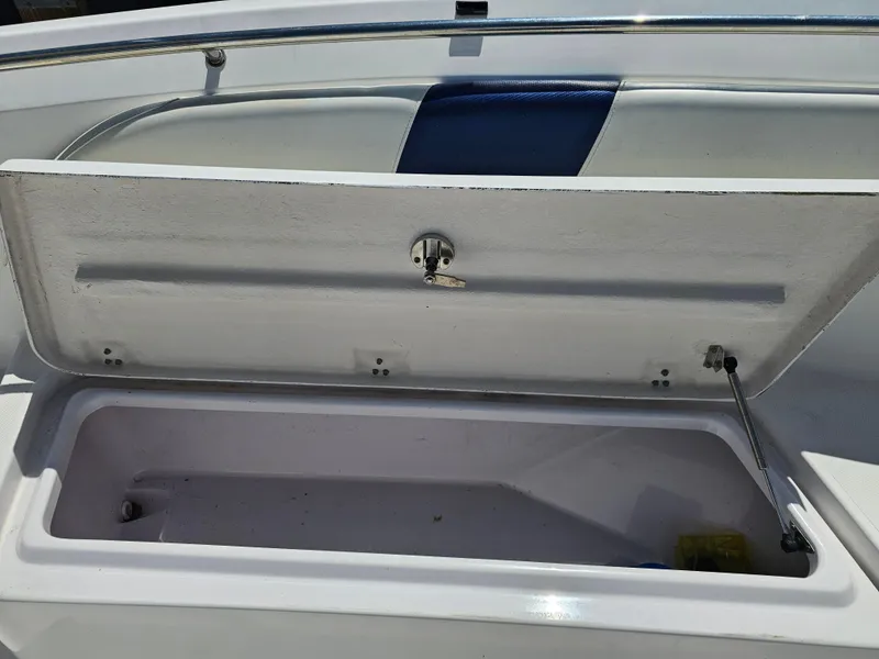 Slide: The Image of Open storage compartment on 2008 Pro-Line 29 Grande Sport boat. - 7