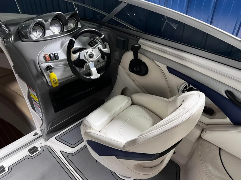 Slide: The Image of 2008 Monterey 214FSC boat cockpit with steering wheel and gauges. - 3