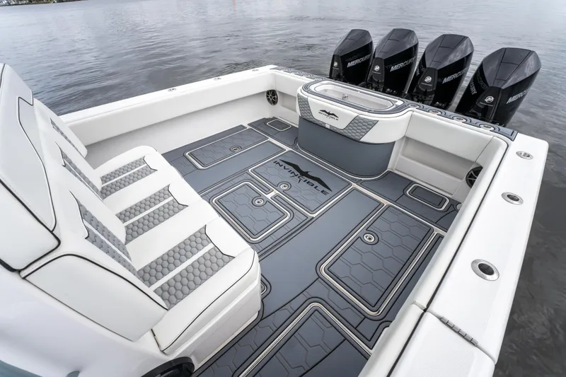 Slide: The Image of 2022 Invincible 39 Open Fisherman boat with spacious deck and four powerful engines. - 24