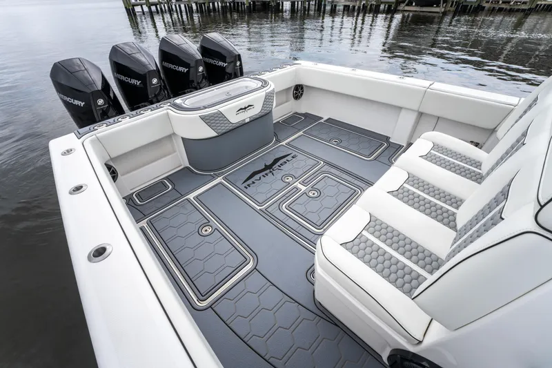 Slide: The Image of 2022 Invincible 39 Open Fisherman boat with spacious deck and multiple outboard engines. - 25