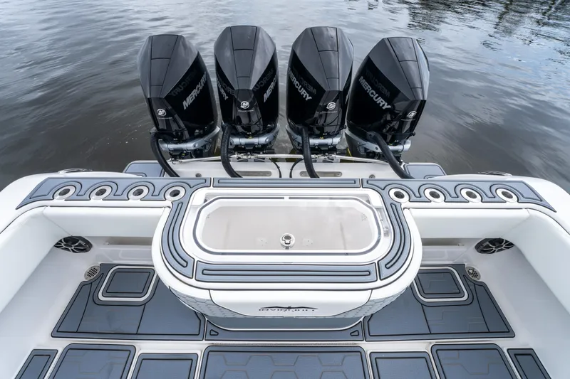 Slide: The Image of 2022 Invincible 39 Open Fisherman boat with four Mercury outboard engines. - 27