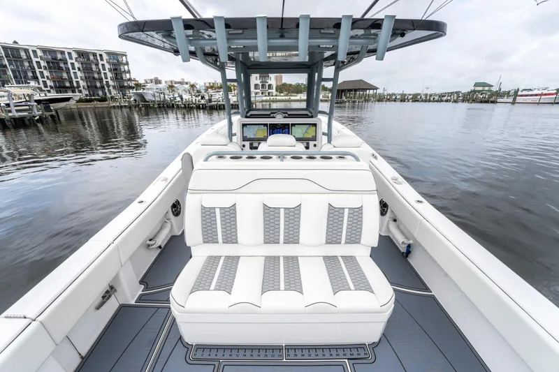 Slide: The Image of 2022 Invincible 39 Open Fisherman boat with luxurious seating and advanced navigation systems. - 30