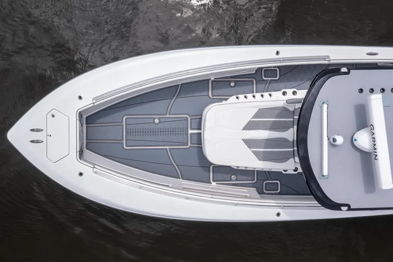 Slide: The Image of 2022 Invincible 39 Open Fisherman boat, aerial view, sleek design, on water. - 4
