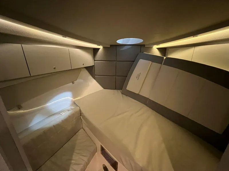 Slide: The Image of Luxurious interior cabin of 2023 Evolve 400HT yacht with modern lighting and comfortable bedding. - 17