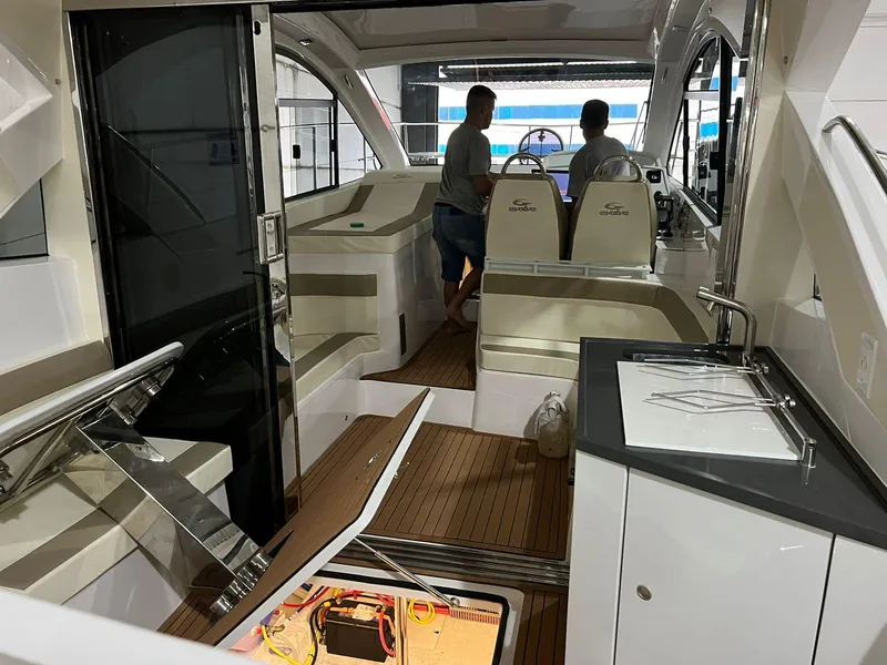 Slide: The Image of Interior of 2023 Evolve 400HT yacht with modern design and control panel. - 8