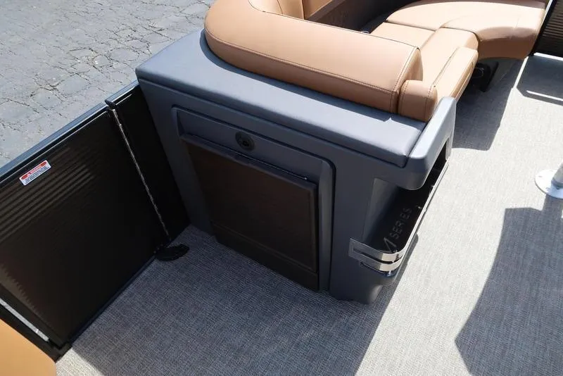 Slide: The Image of 2025 Bennington M Quad Bench 22 MFB with tan seating and storage compartment. - 20