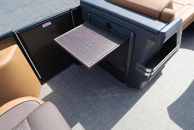 Slide: The Image of 2025 Bennington M Quad Bench 22 MFB with fold-out table and luxurious seating. - 23