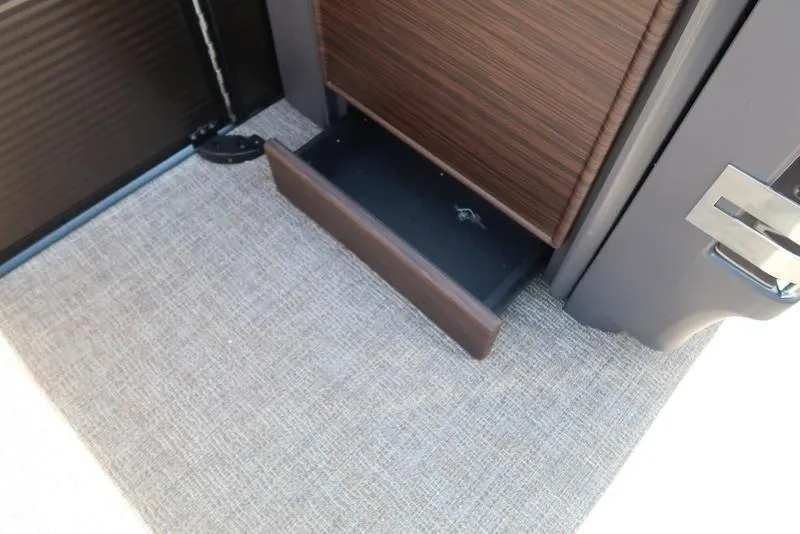 Slide: The Image of Open storage drawer in Bennington M Quad Bench 22 MFB, 2025 model. - 24