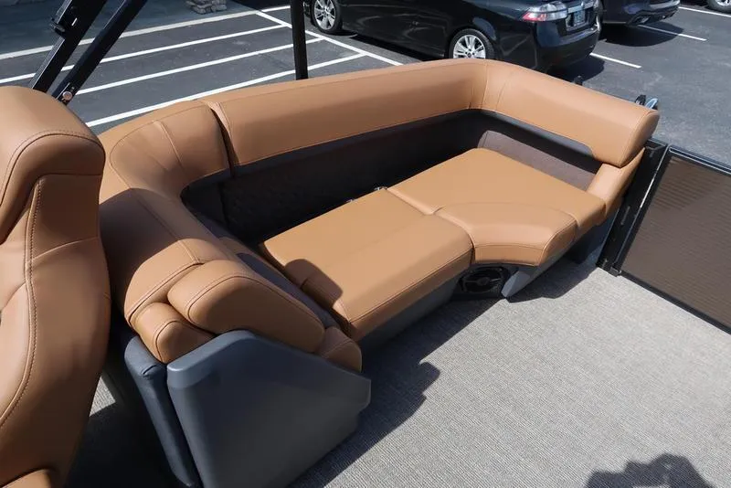 Slide: The Image of Luxurious tan seating on 2025 Bennington M Quad Bench 22 MFB boat. - 28