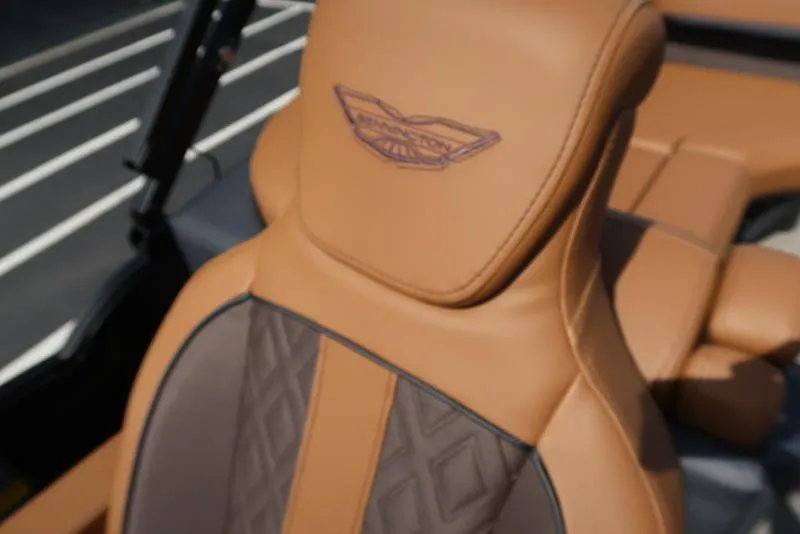 Slide: The Image of Luxurious tan leather seat of 2025 Bennington M Quad Bench 22 MFB. - 3
