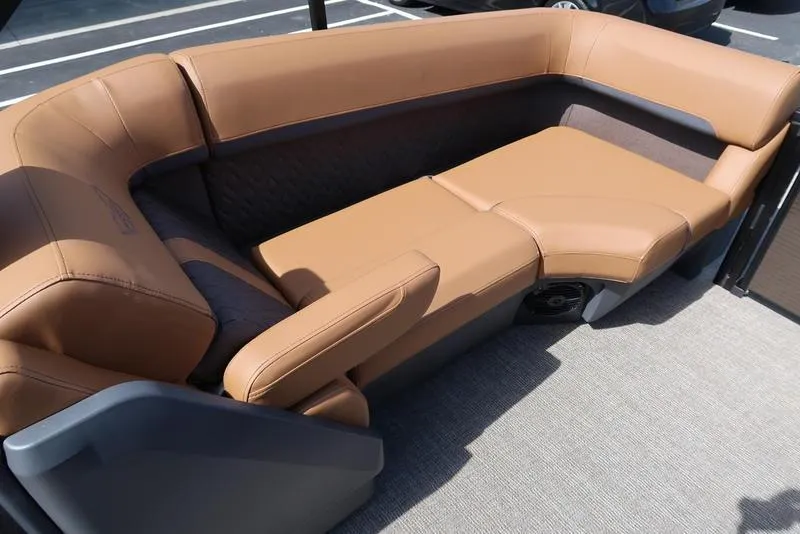 Slide: The Image of Luxurious seating on 2025 Bennington M Quad Bench 22 MFB boat, featuring tan upholstery. - 30