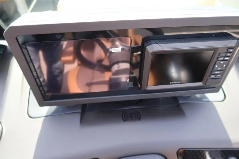Slide: The Image of Dashboard of 2025 Bennington M Quad Bench 22 MFB with Garmin display. - 35