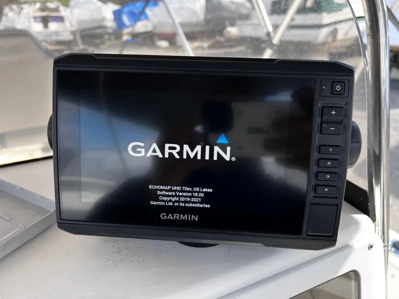 Slide: The Image of Garmin ECHOMAP UHD display on 2001 Aquasport 190 Osprey boat dashboard. - 7