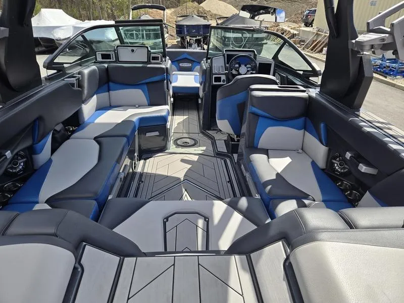 Slide: The Image of 2019 Supra SA boat interior with modern seating and sleek design. - 18