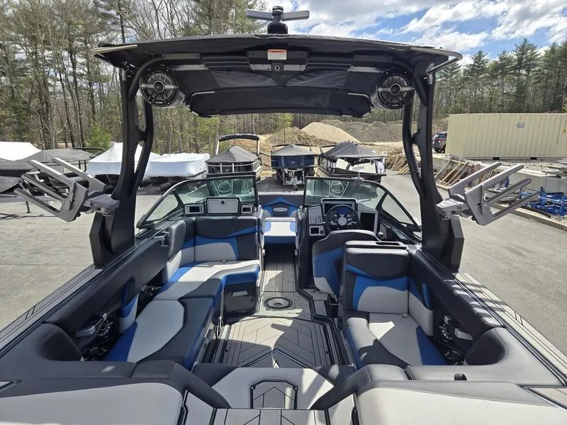 Slide: The Image of 2019 Supra SA boat interior with modern seating and audio system. - 19