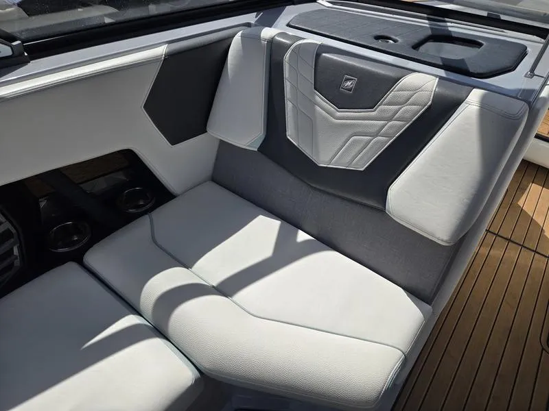 Slide: The Image of 2022 Nautique Super Air Nautique G23 interior seating with modern design and premium upholstery. - 11