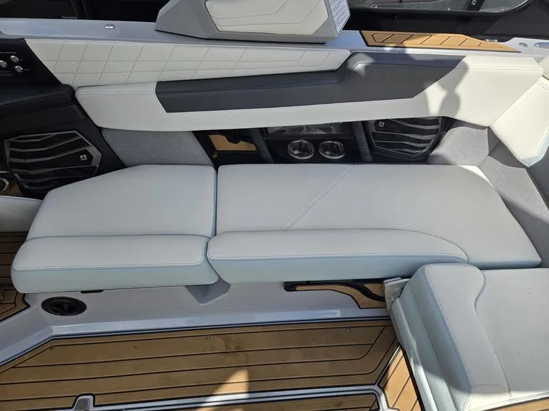 Slide: The Image of 2022 Nautique Super Air Nautique G23 interior seating with sleek design and premium materials. - 12