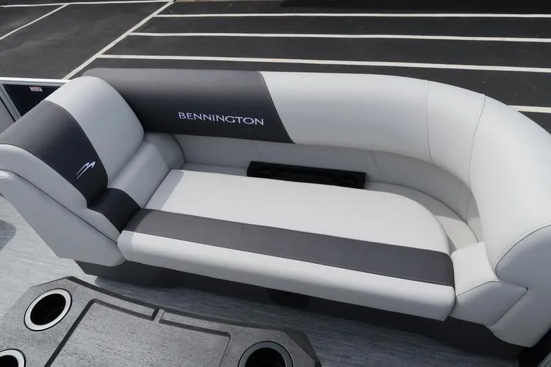 Slide: The Image of 2025 Bennington S Quad Bench 20 SSR, sleek gray and black boat seating. - 12