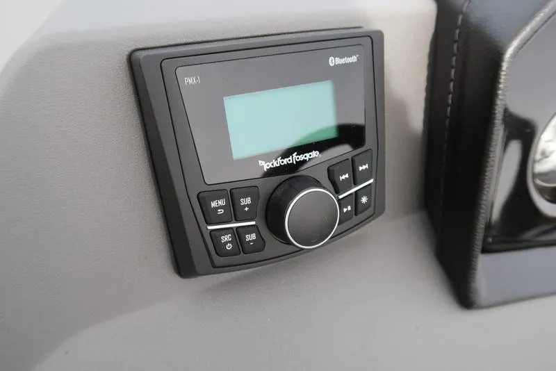 Slide: The Image of Control panel of 2025 Bennington S Quad Bench 20 SSR with Rockford Fosgate audio system. - 17
