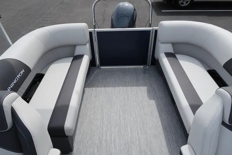 Slide: The Image of 2025 Bennington S Quad Bench 20 SSR interior with gray seating and flooring. - 20