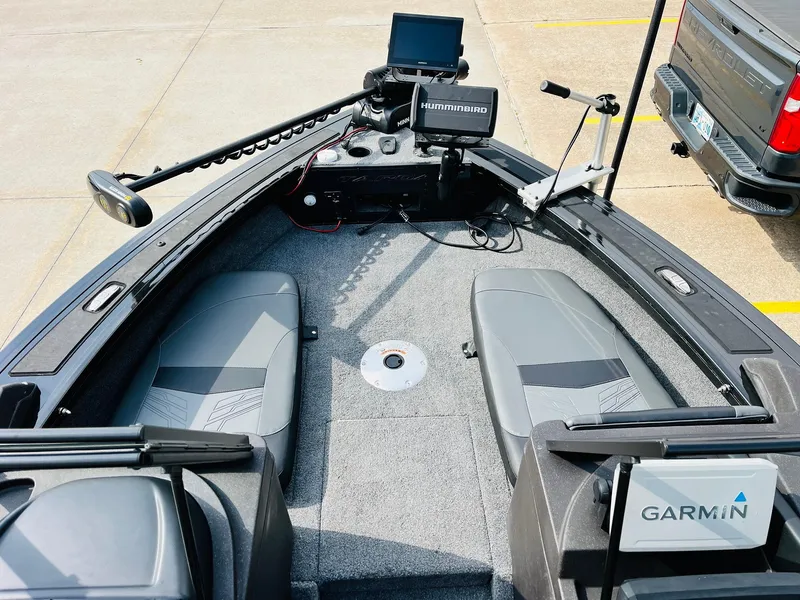 Slide: The Image of 2023 Tracker Targa V-19 WT boat interior with Garmin electronics and seating. - 11