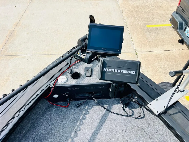 Slide: The Image of 2023 Tracker Targa V-19 WT boat dashboard with Humminbird electronics and navigation equipment. - 17