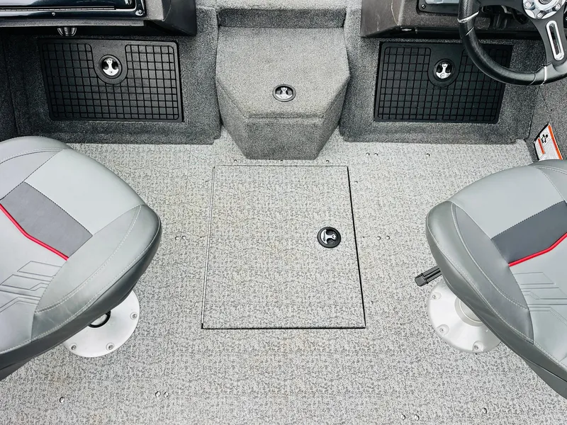 Slide: The Image of 2023 Tracker Targa V-19 WT boat interior with gray seating and storage compartments. - 33