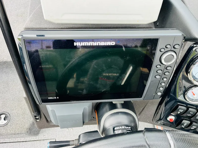 Slide: The Image of Helix 9 fishfinder on 2023 Tracker Targa V-19 WT dashboard, featuring Humminbird technology. - 39