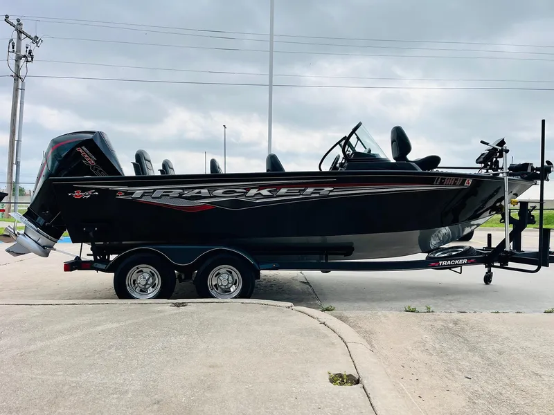 Slide: The Image of 2023 Tracker Targa V-19 WT boat on trailer, side view, outdoors. - 4