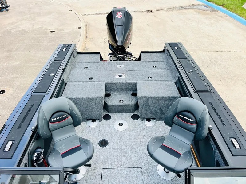 Slide: The Image of 2023 Tracker Targa V-19 WT boat interior with two seats and motor. - 46