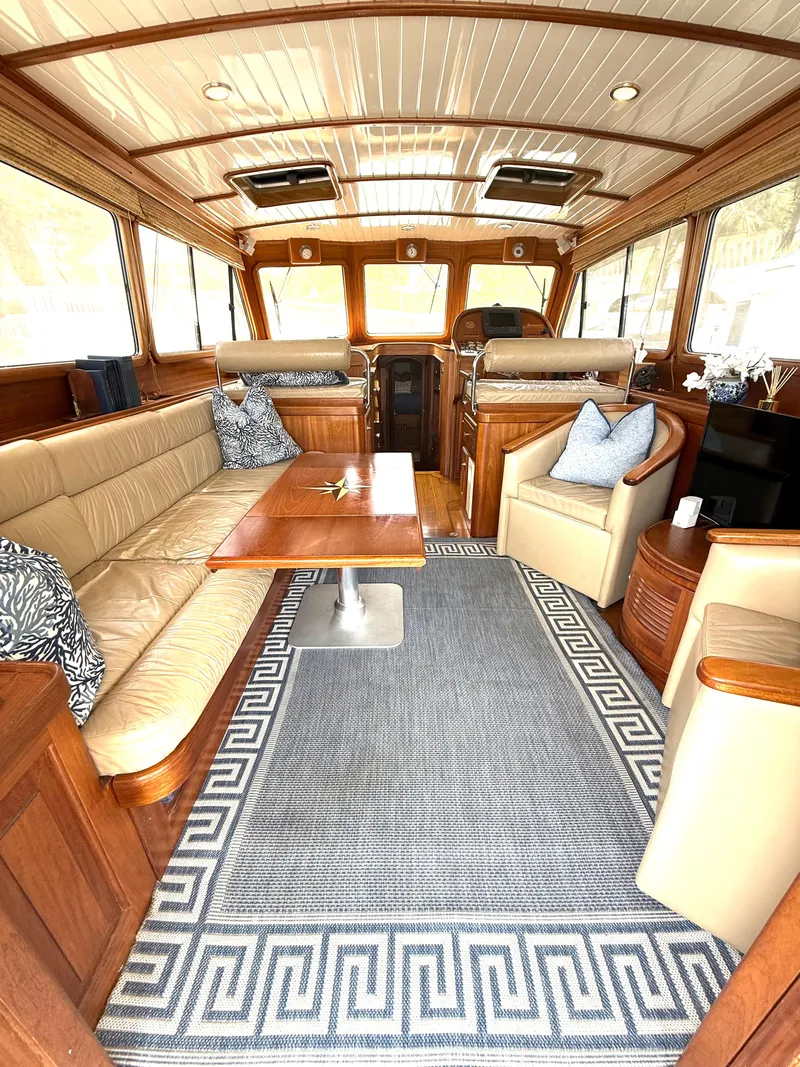 Slide: The Image of Luxurious interior of 2003 Vicem 51 Classic yacht with elegant wood finish and comfortable seating. - 12