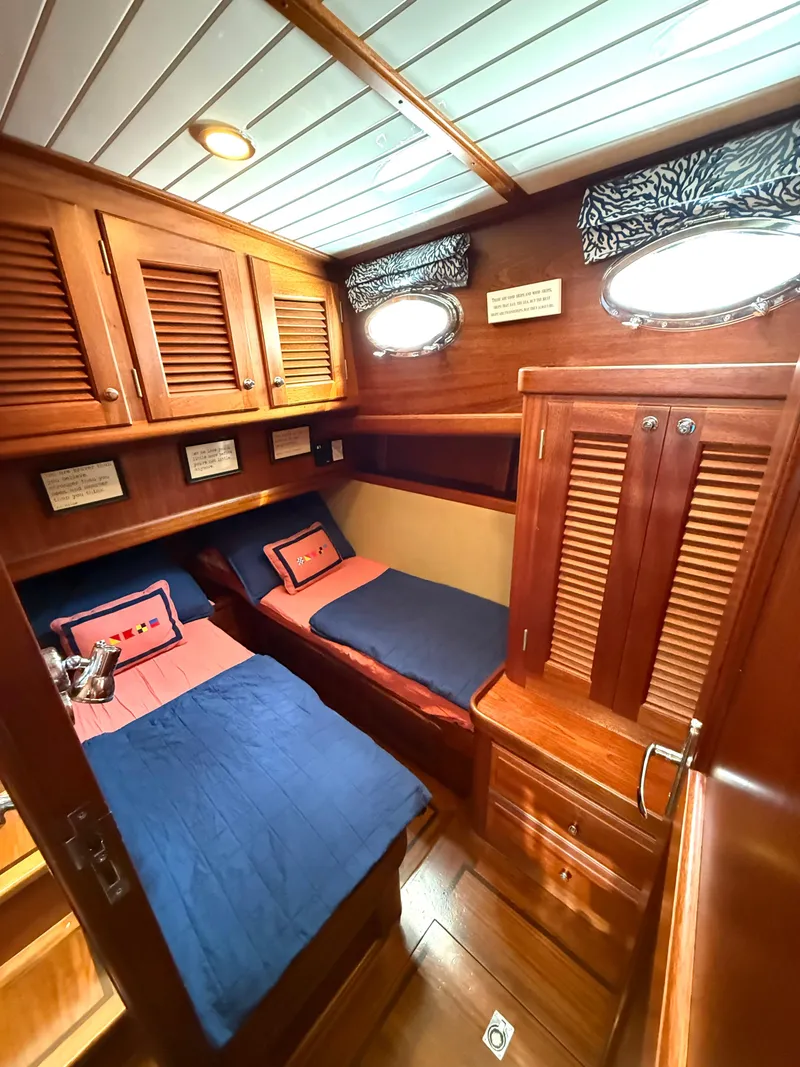 Slide: The Image of Cozy cabin interior of 2003 Vicem 51 Classic yacht with twin beds and wooden furnishings. - 26