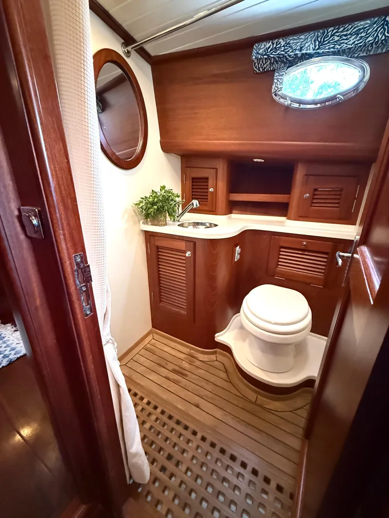 Slide: The Image of Luxurious wooden bathroom interior of 2003 Vicem 51 Classic yacht with elegant fixtures. - 27