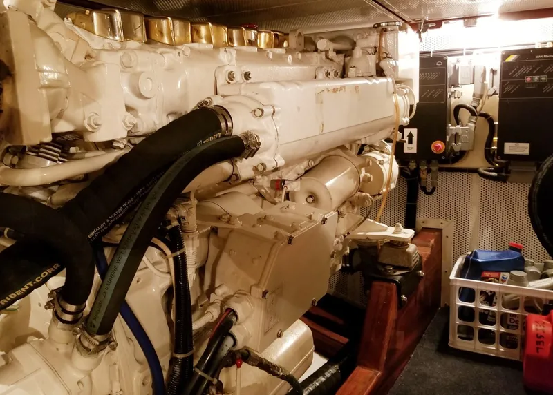 Slide: The Image of Engine room of 2003 Vicem 51 Classic yacht, showcasing detailed machinery and components. - 30
