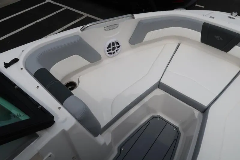 Slide: The Image of 2025 Chaparral 21 SSi boat interior with gray and white seating. - 13