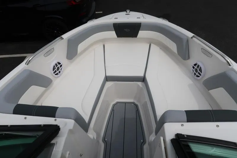 Slide: The Image of 2025 Chaparral 21 SSi boat interior with spacious seating and modern design. - 15