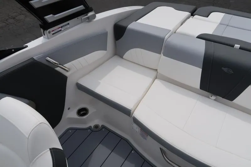 Slide: The Image of 2025 Chaparral 21 SSi boat interior with gray and white seating. - 26
