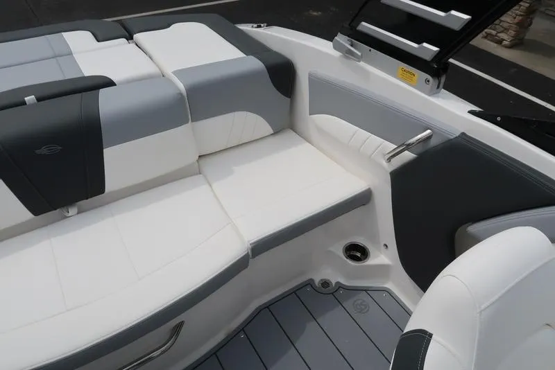 Slide: The Image of 2025 Chaparral 21 SSi boat interior with gray and white seating. - 28