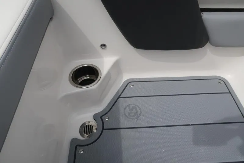 Slide: The Image of 2025 Chaparral 21 SSi boat interior with cup holder and non-slip flooring. - 29