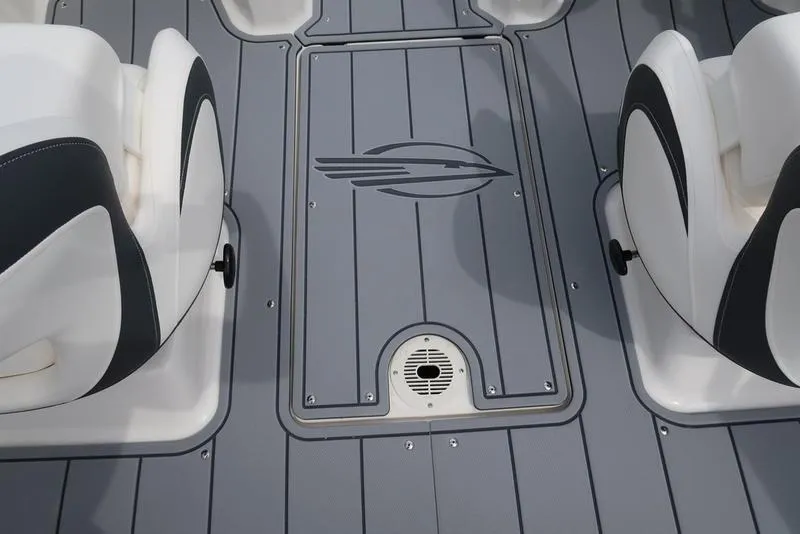 Slide: The Image of 2025 Chaparral 21 SSi boat interior with gray flooring and white seats. - 30